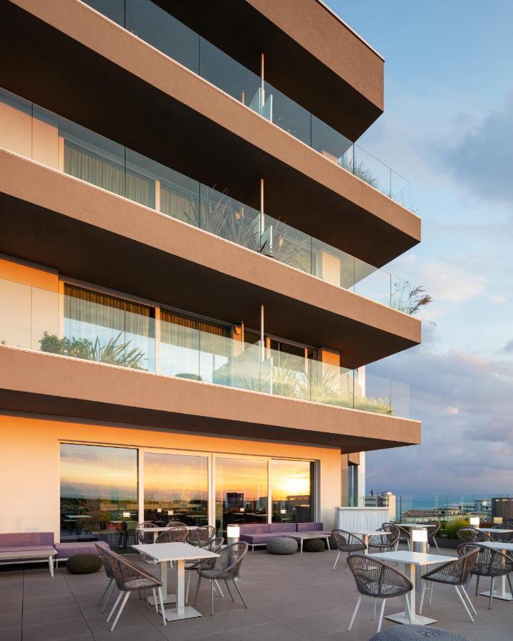 J44 Lifestyle Hotel Лідо-ді-Єзоло Екстер'єр фото The 3D rendering of the building